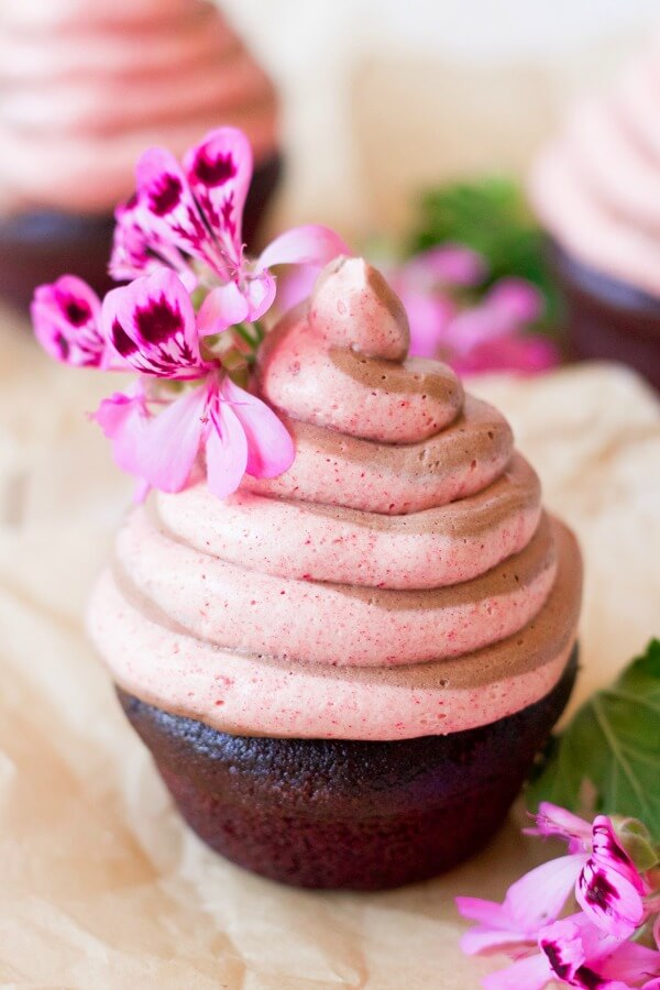 Chocolate raspberry swirl frosting on chocolate cupcake.