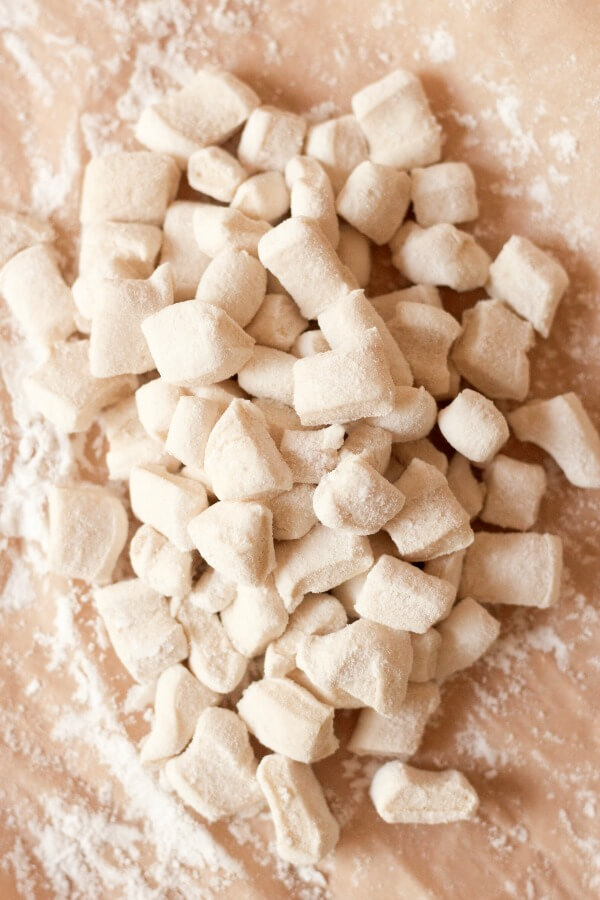 A big pile of homemade marshmallows cut into mini marshmallows.