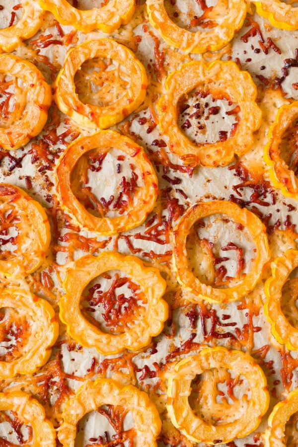 Roasted Delicata squash rounds with crispy parmesan.